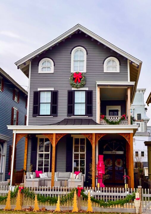 Modern Christmas decorations in pink and silver on a classic Victorian home on Gurney St in Cape May