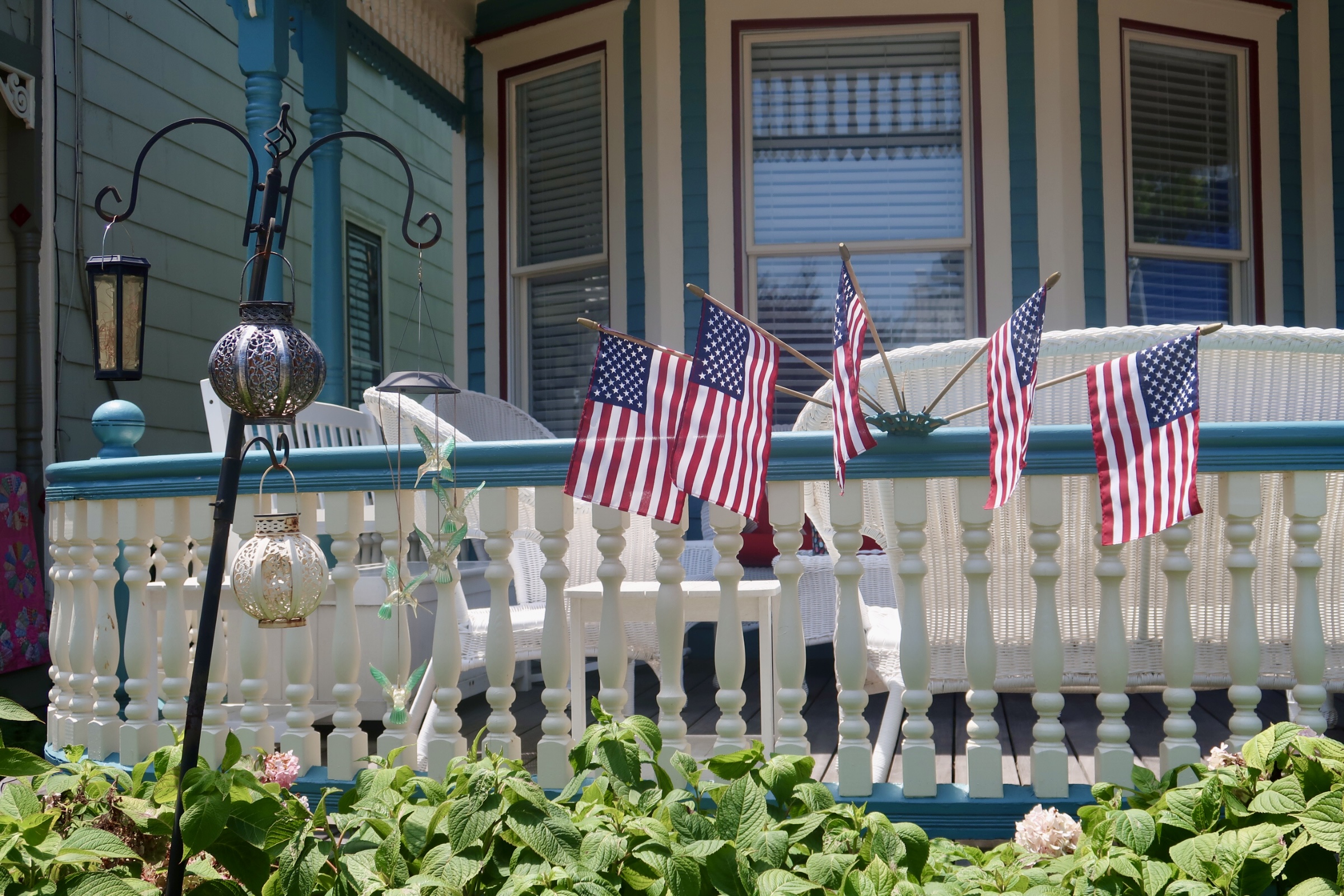 Mini American flags on porch
