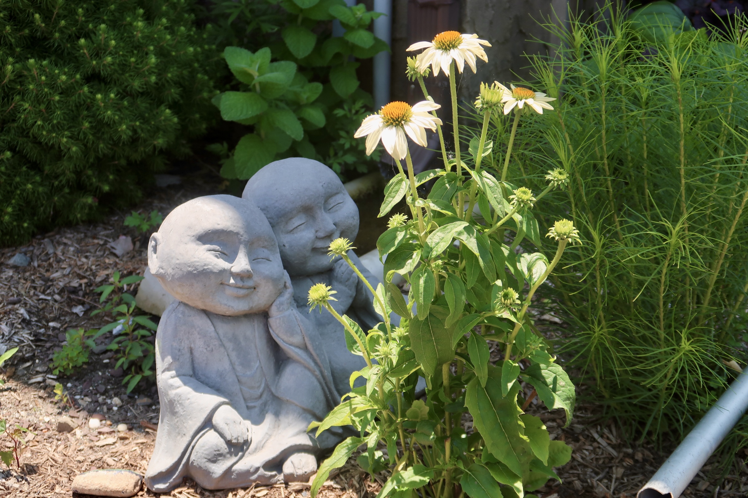 Garden statues with flowers 