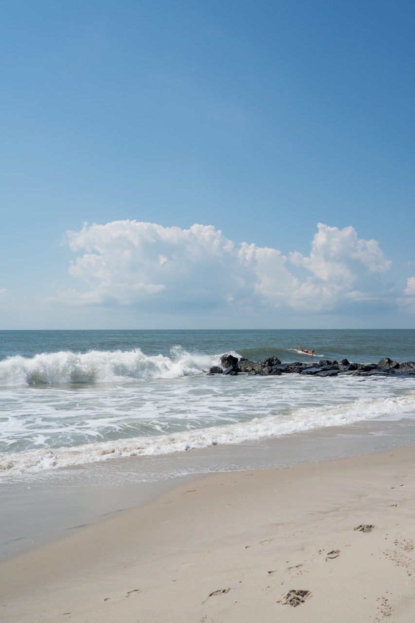Lone Surfer of the beach of Cape May, New Jersey